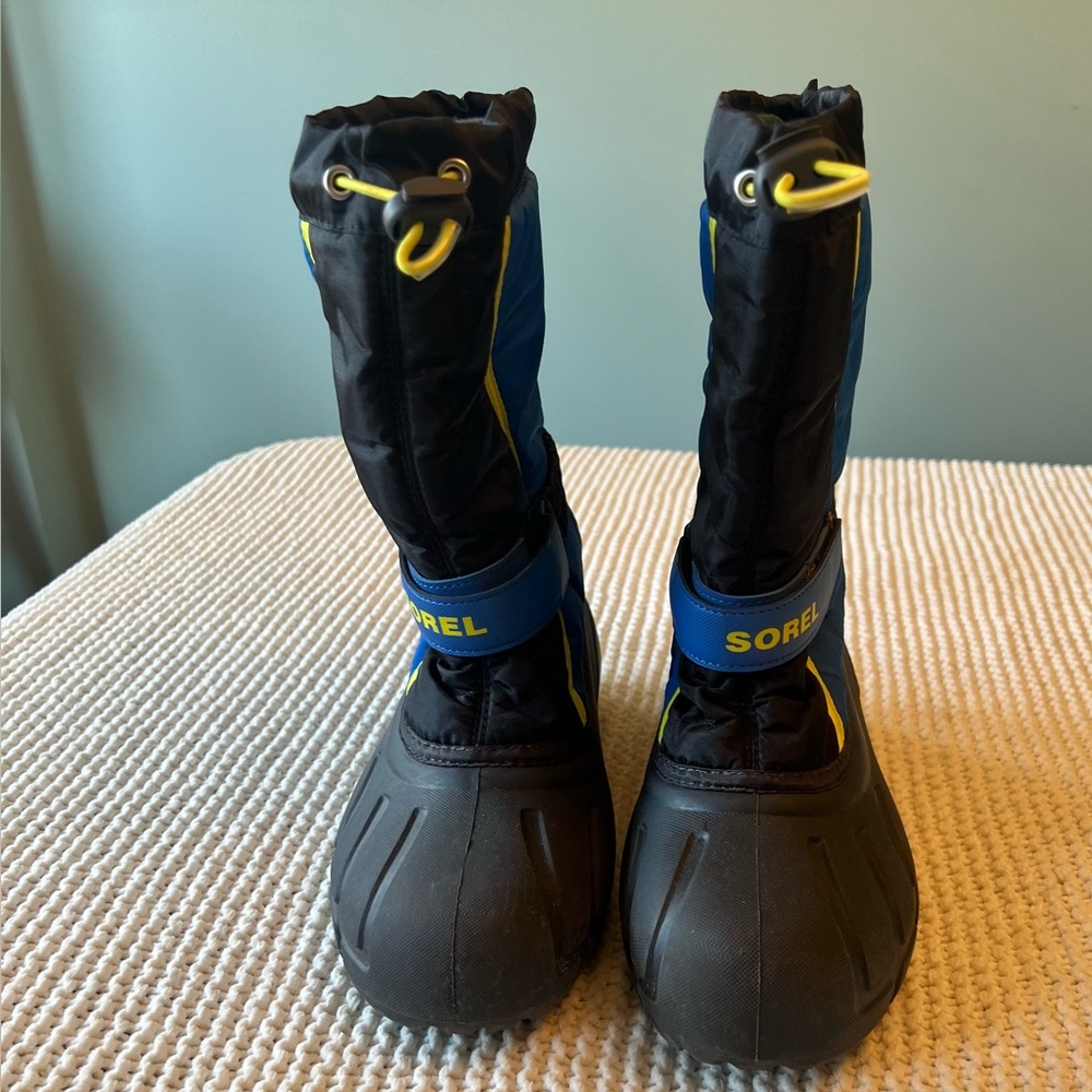 Sorel Kids' Black and Blue Snow Boots with Yellow Accents